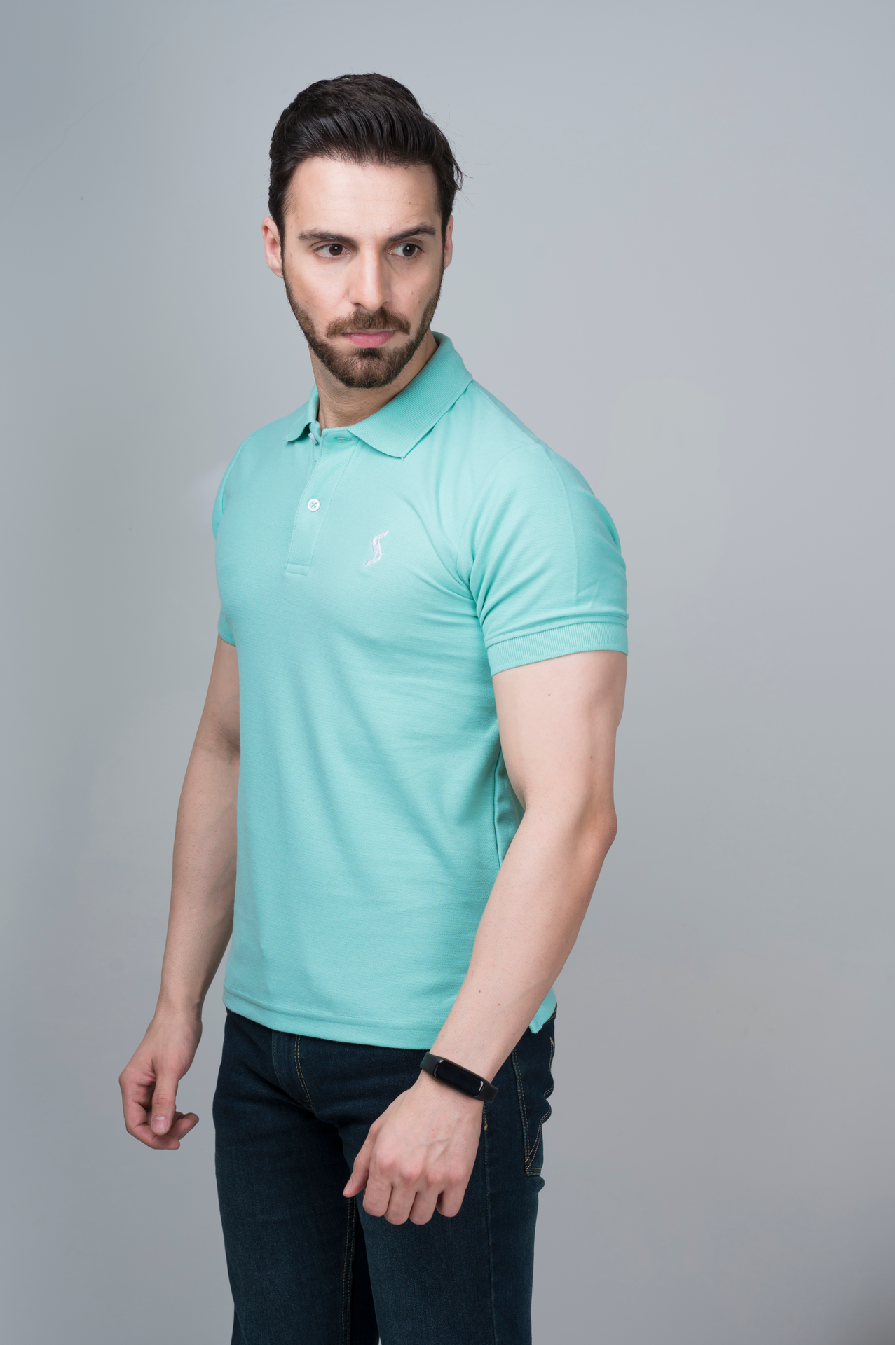 Side view of Men’s Beveled Glass Classic Polo, showcasing the fit and stylish short sleeves.