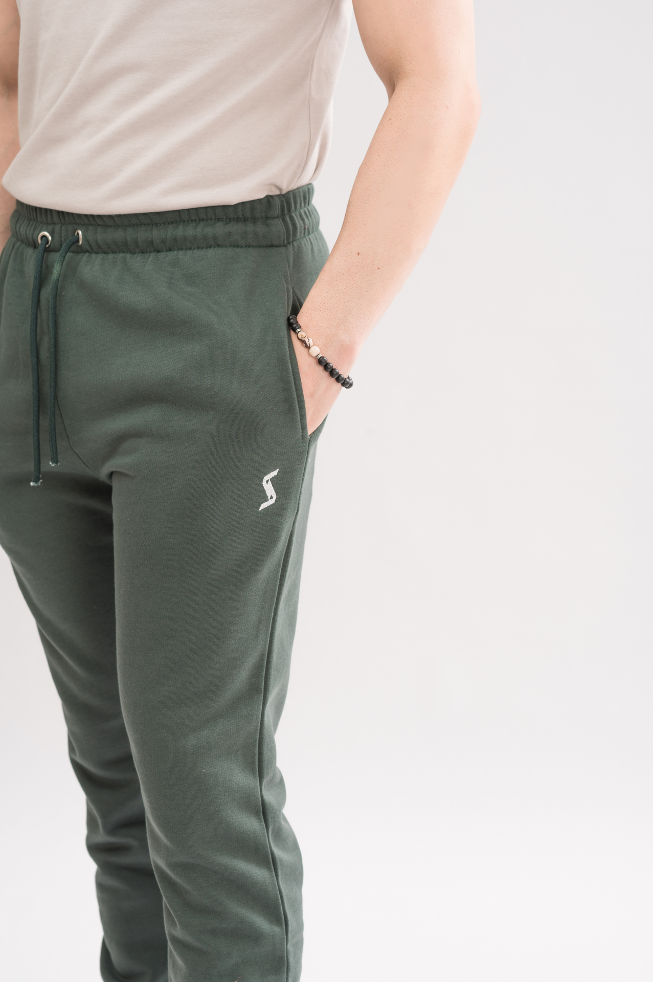 Close-up of Moss Green Elastic Waist Relaxed Fit Trouser material, highlighting the soft and comfortable fabric.