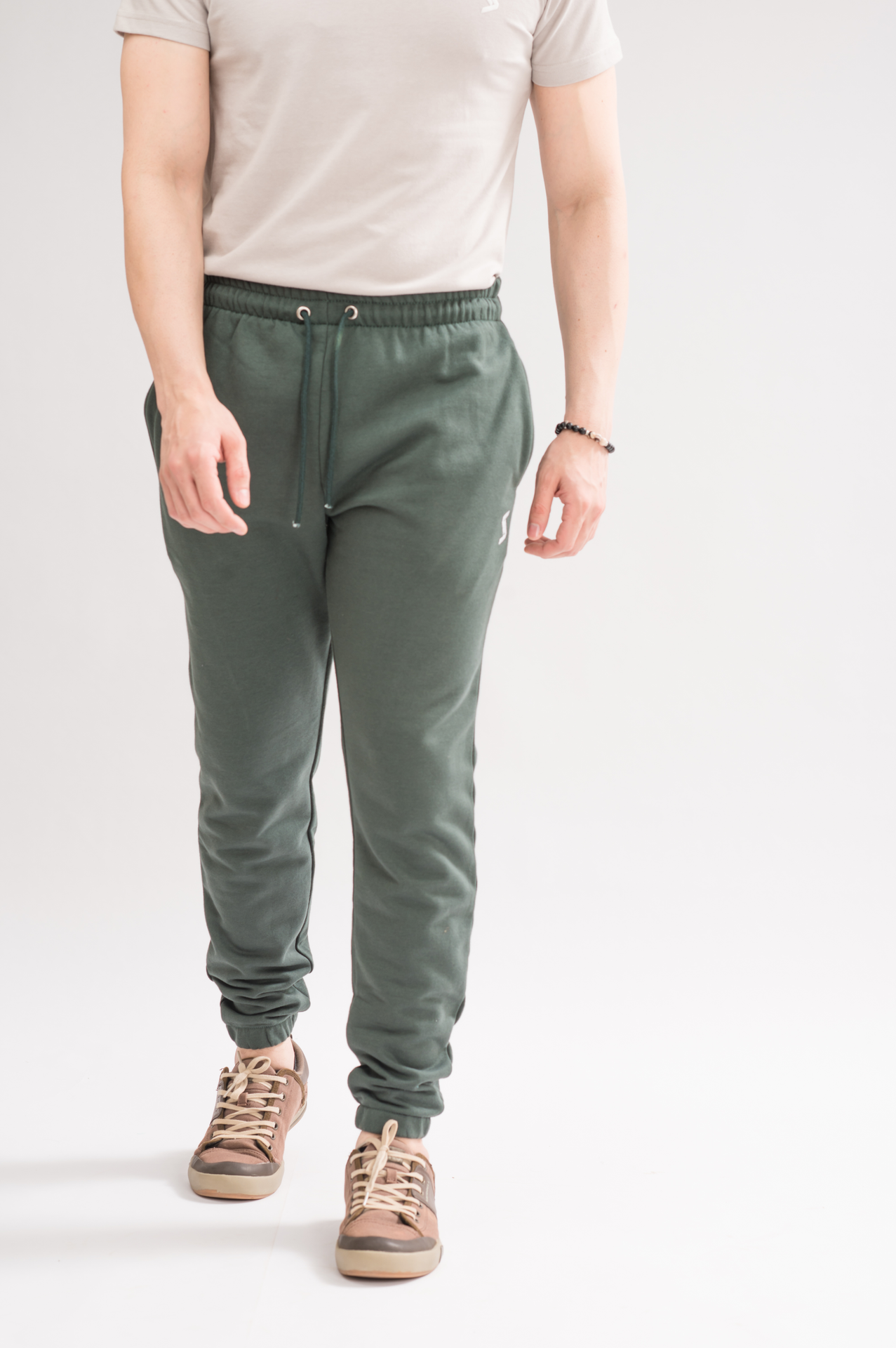 Men’s Moss Green Elastic Waist Relaxed Fit Trouser front view, featuring a stretchable waistband for all-day comfort.