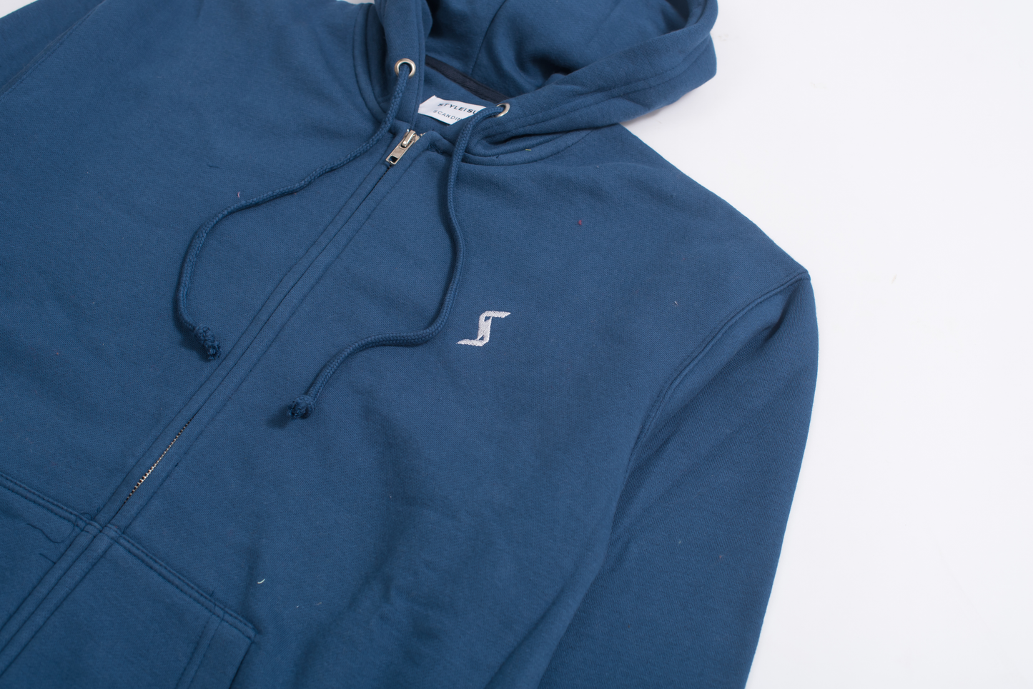 Close-up of Navy Classic Zip-Up Hoodie, showcasing brushed interior for unparalleled softness and cozy feel.