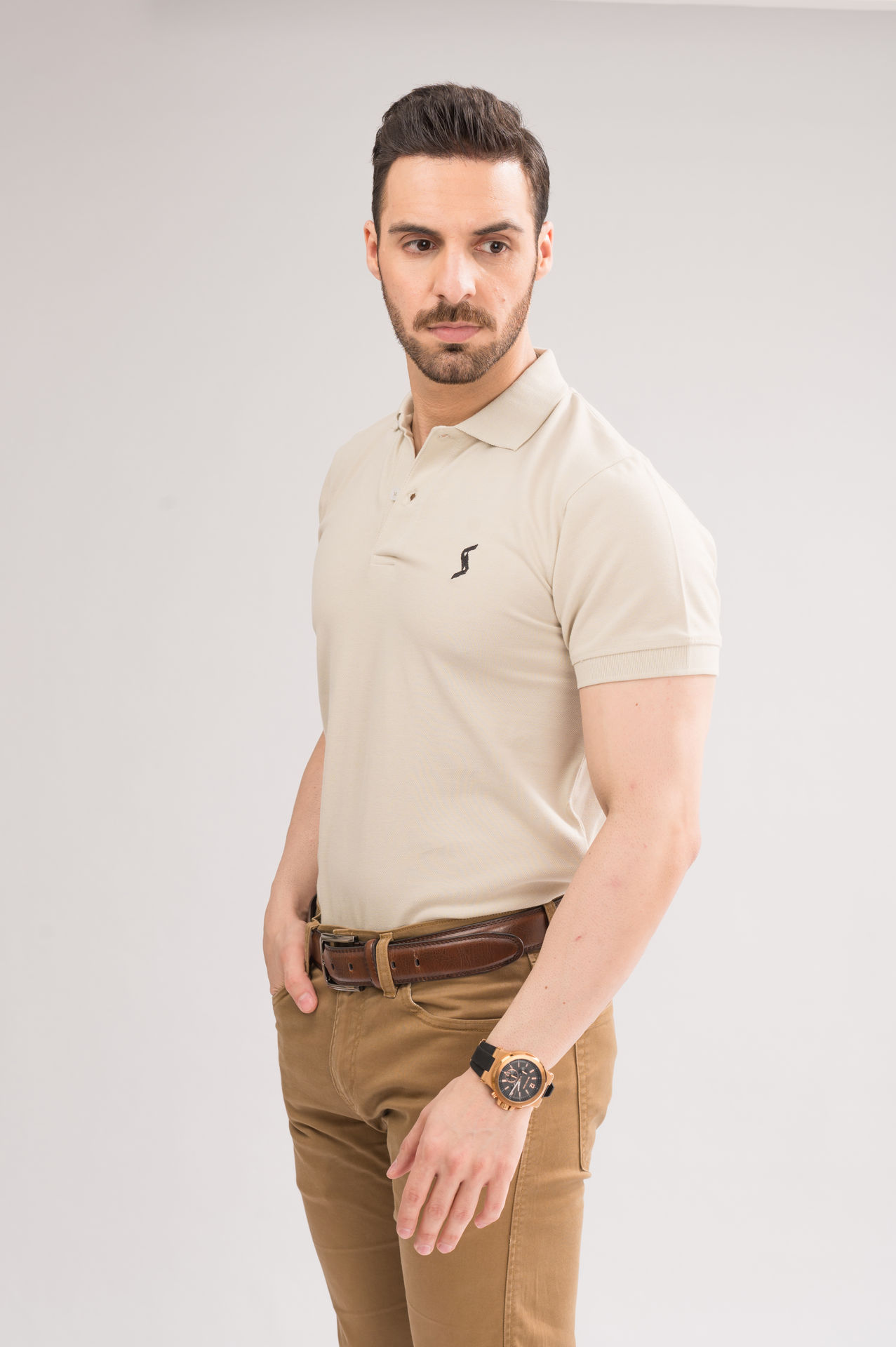 Side view of Men’s Blanco Classic Polo, showcasing the fit and stylish short sleeves.