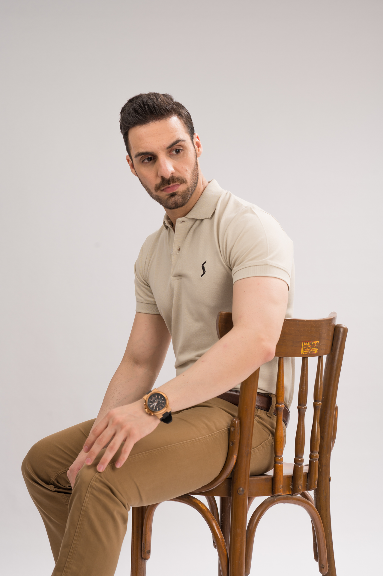 Side view of Men’s Blanco Classic Polo, showcasing the fit and stylish short sleeves.