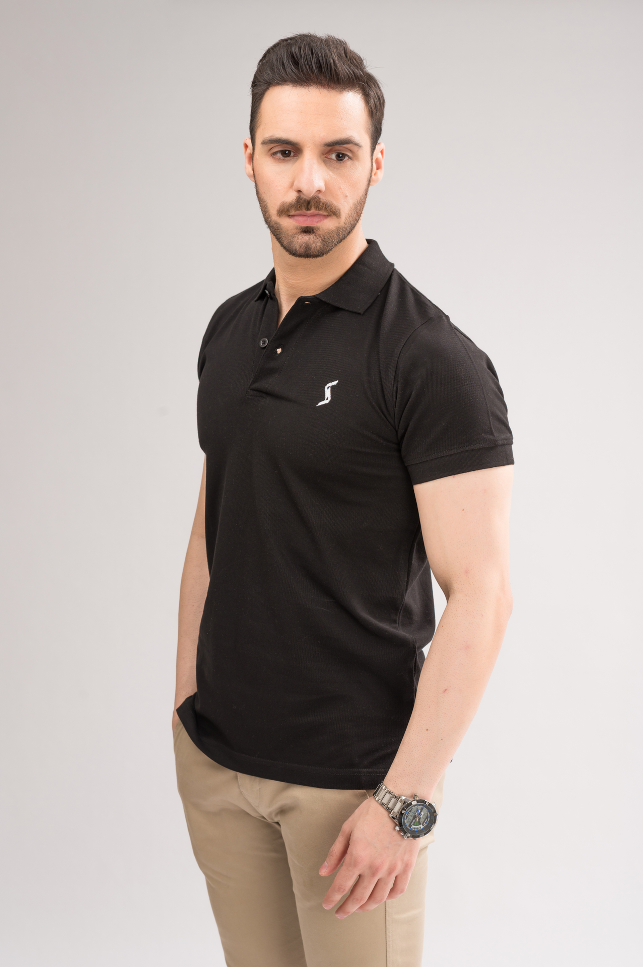 Men’s Black Classic Polo front view, featuring sleek spread collar and short sleeves for a sleek look.