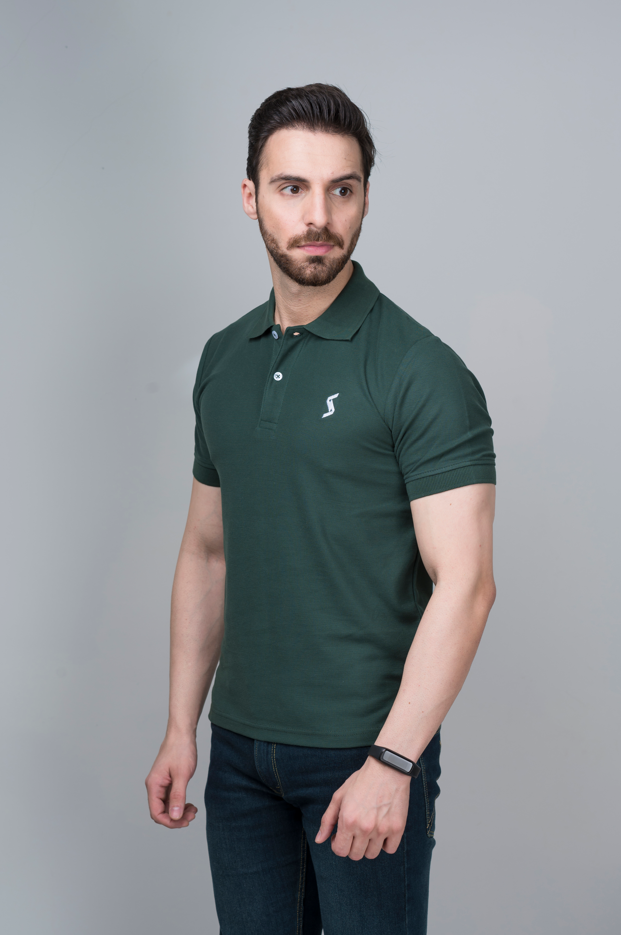 ide view of Men’s Dark Moss Green Classic Polo, showcasing the fit and stylish short sleeves.