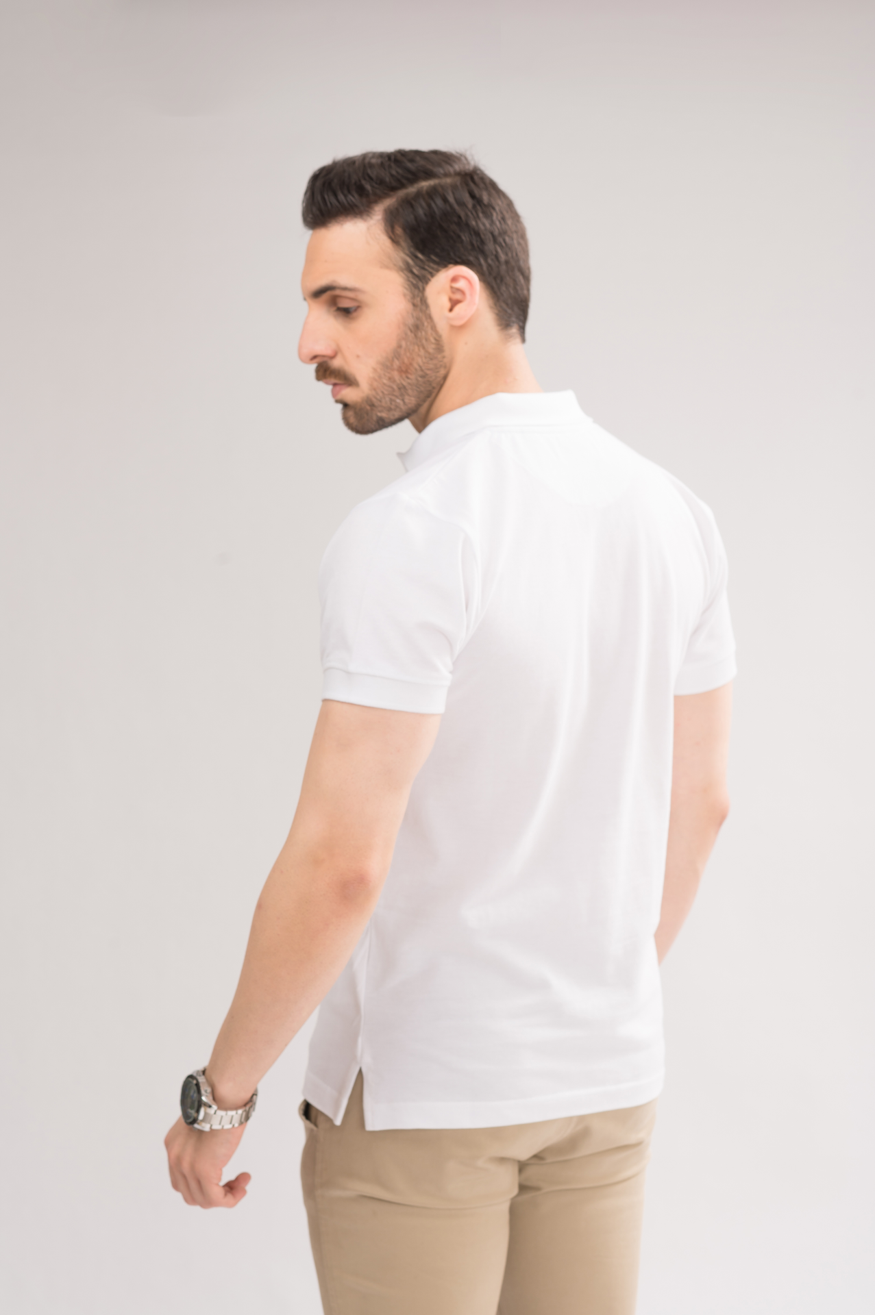 Men’s White Classic Polo back view, displaying the classic design and smooth finish.