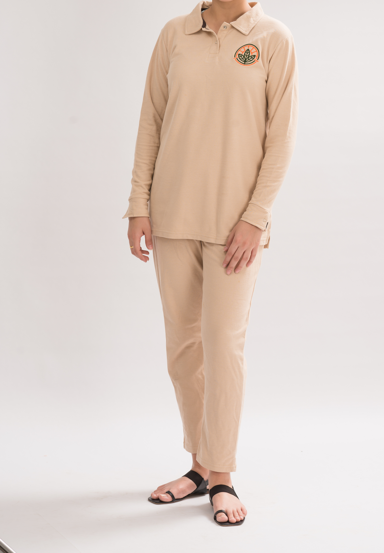 Women’s Oatmeal Long Sleeve Polo Dress Shirt front view, combining comfort and simplicity for a chic look.