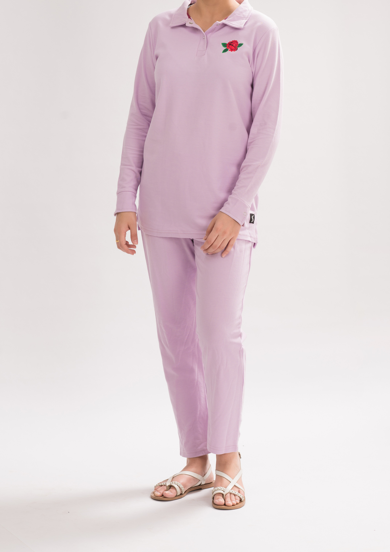 Women’s Orchid Bloom Long Sleeve Polo Dress Shirt front view, combining comfort and simplicity for a chic look.