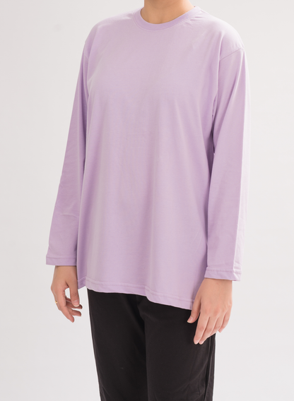 Women’s Oversized Crew Neck T-Shirt Dress in Lilac - Front View. Relaxed fit with long sleeves for a chic and comfortable look.