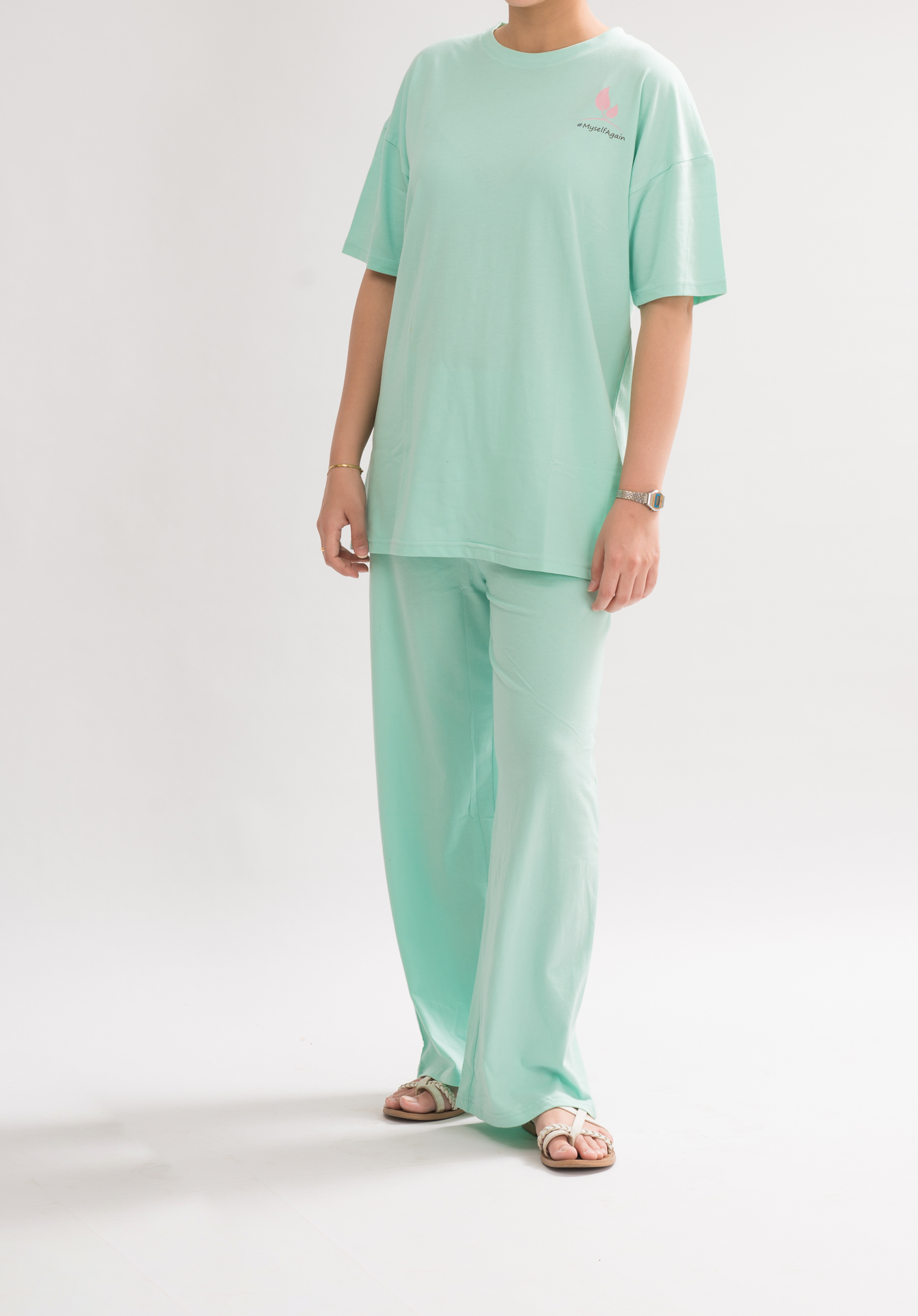 Women’s HoneyDew Oversized Crew Neck T-Shirt Dress front view, featuring a relaxed fit and half sleeves for a chic and comfortable look.