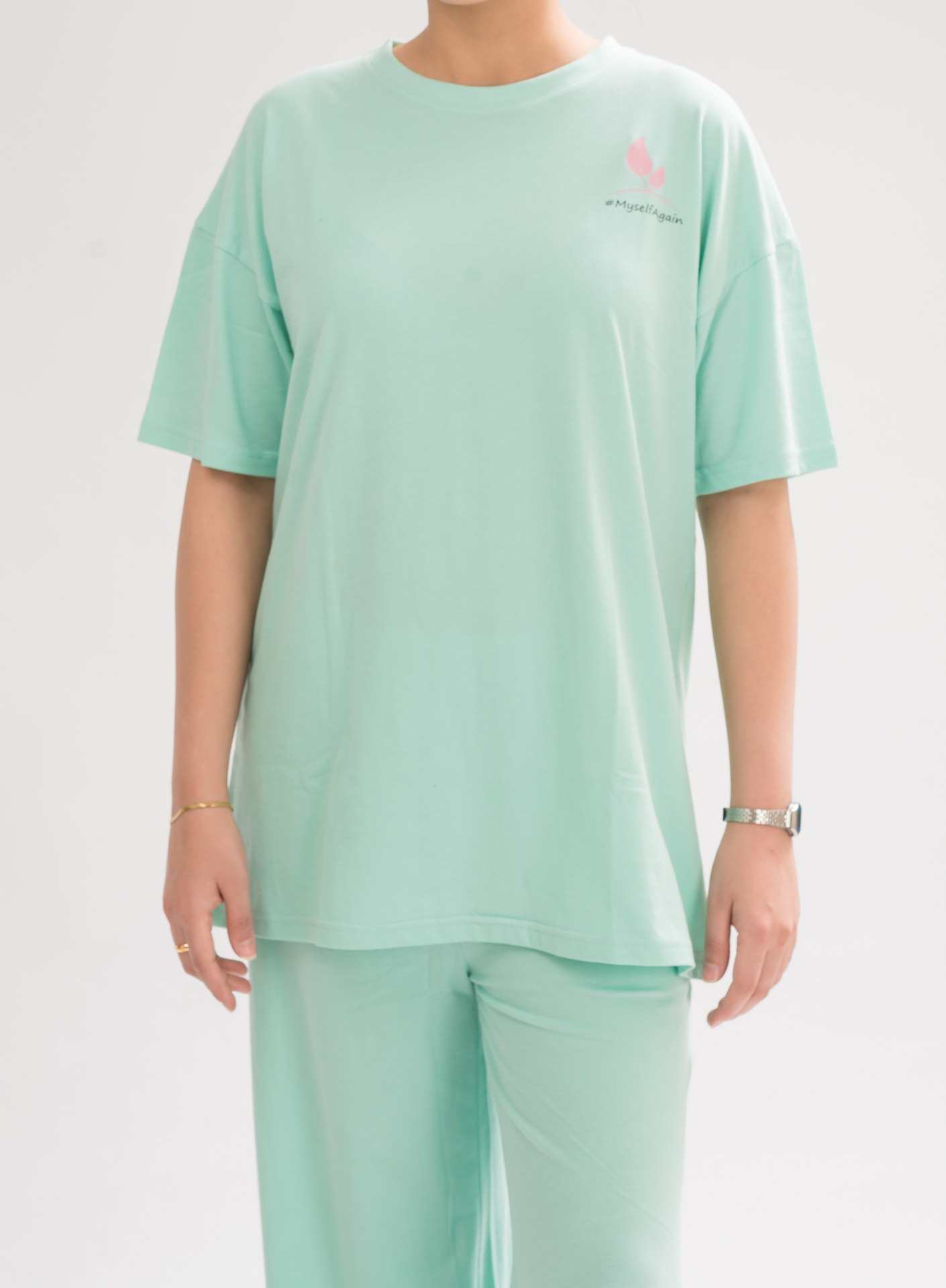 Women’s HoneyDew Oversized Crew Neck T-Shirt Dress front view, featuring a relaxed fit and half sleeves for a chic and comfortable look.