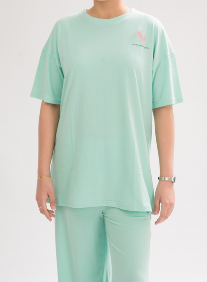 Women’s HoneyDew Oversized Crew Neck T-Shirt Dress front view, featuring a relaxed fit and half sleeves for a chic and comfortable look.