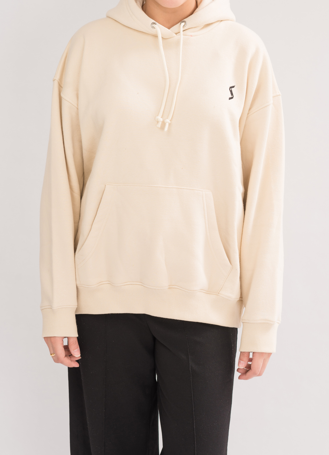 Women’s Classic Oversized Hoodie in MoonBeam - Front View. Features a contoured silhouette, dropped shoulders, and a double-layered hood for modern casualwear.