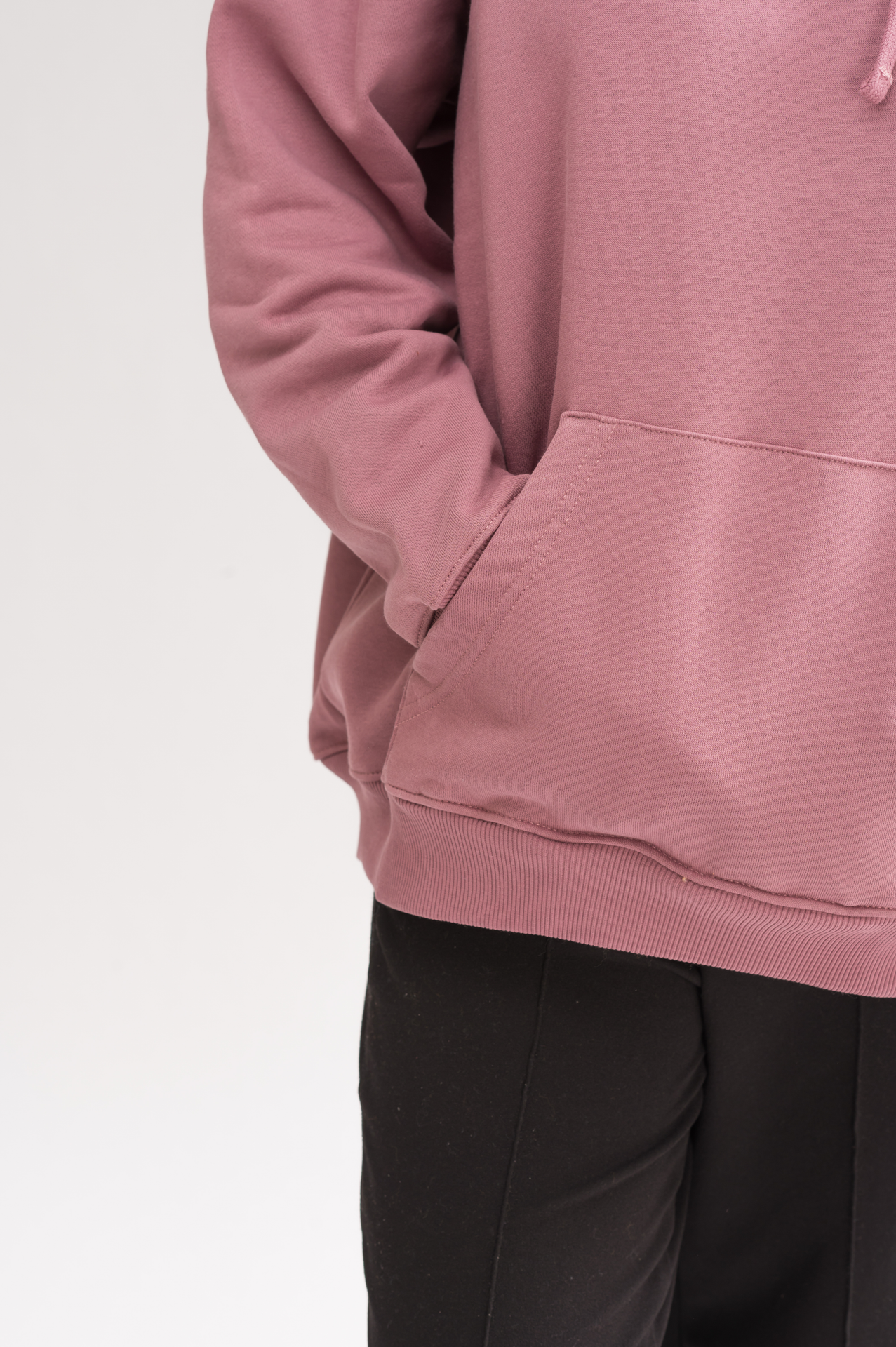 Close-up of the soft fabric of Women’s Classic Oversized Hoodie in Mauve Mist. Perfect for comfort and style with a luxurious brushed interior.