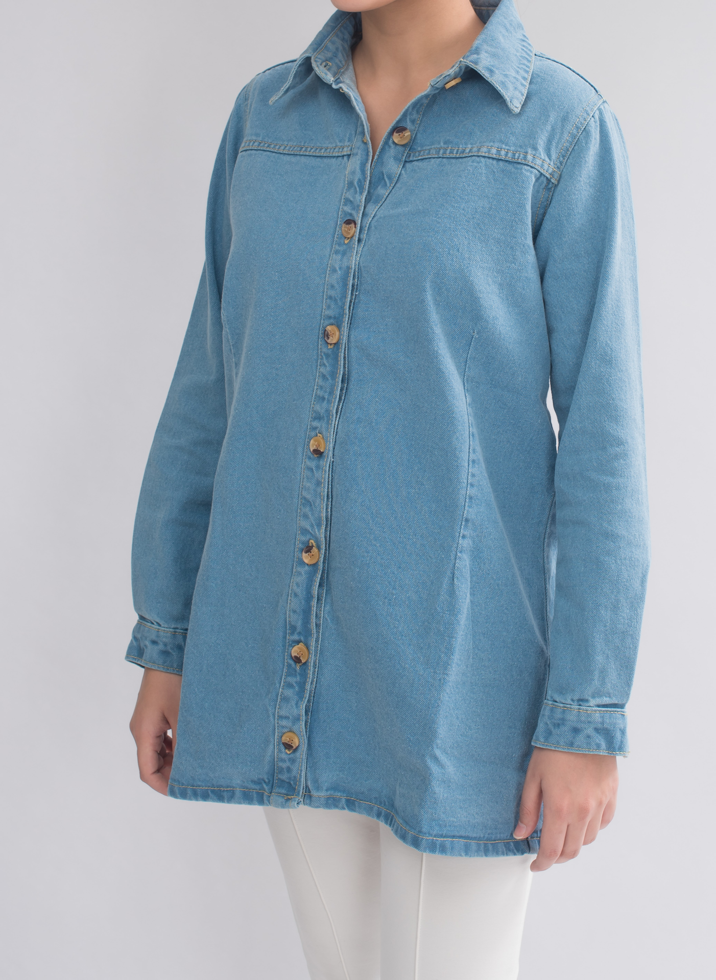 Side view of Women’s Long-Sleeve Denim Dress Shirt, highlighting the timeless sophistication and elegant design.