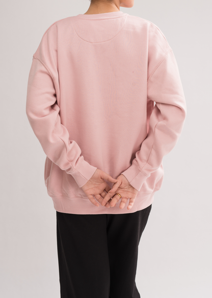 Back view of Women’s Peach Skin Comfortable Loose Fit Sweatshirt, displaying the ribbed hem and cuffs for a stylish finish.