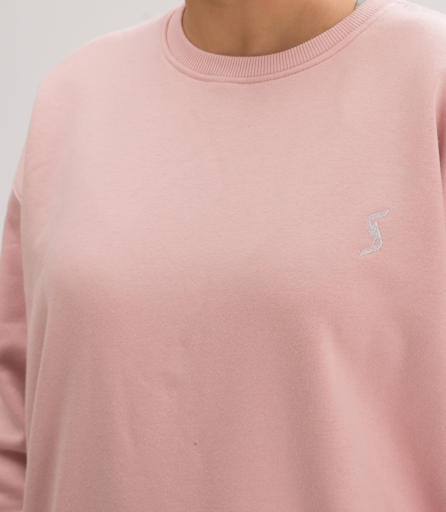 Close-up of the soft brushed interior of Women’s Peach Skin Comfortable Loose Fit Sweatshirt, highlighting the premium cotton blend.