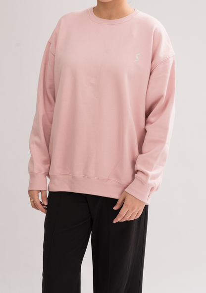 Women’s Peach Skin Comfortable Loose Fit Sweatshirt front view, featuring a round rib-trimmed neckline and low drop shoulders.