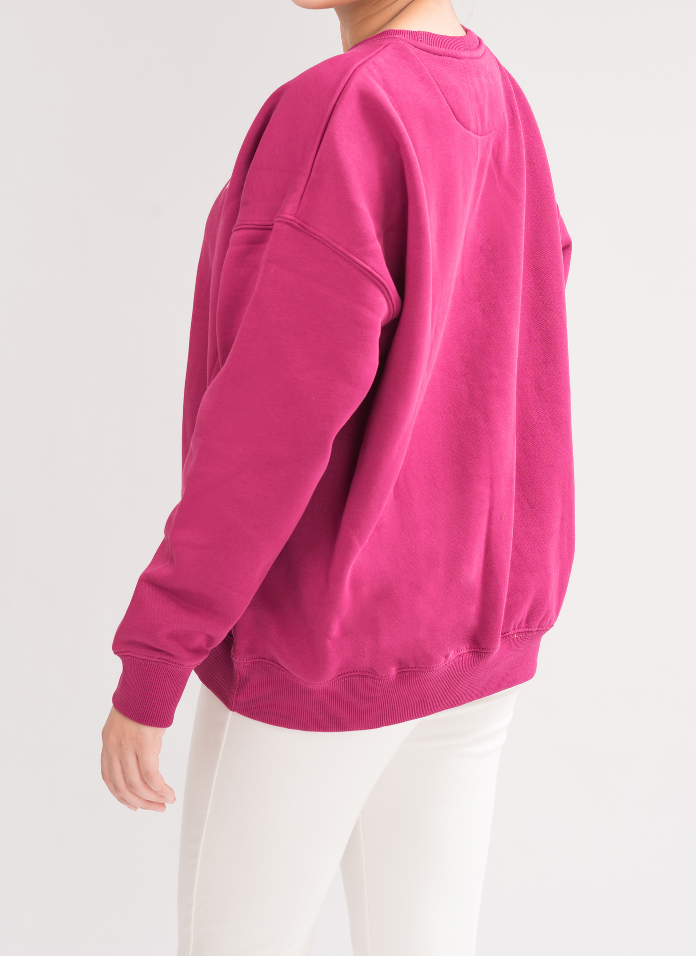 Side view of Women’s Vivacious Comfortable Loose Fit Sweatshirt, showcasing the relaxed fit and modern design.