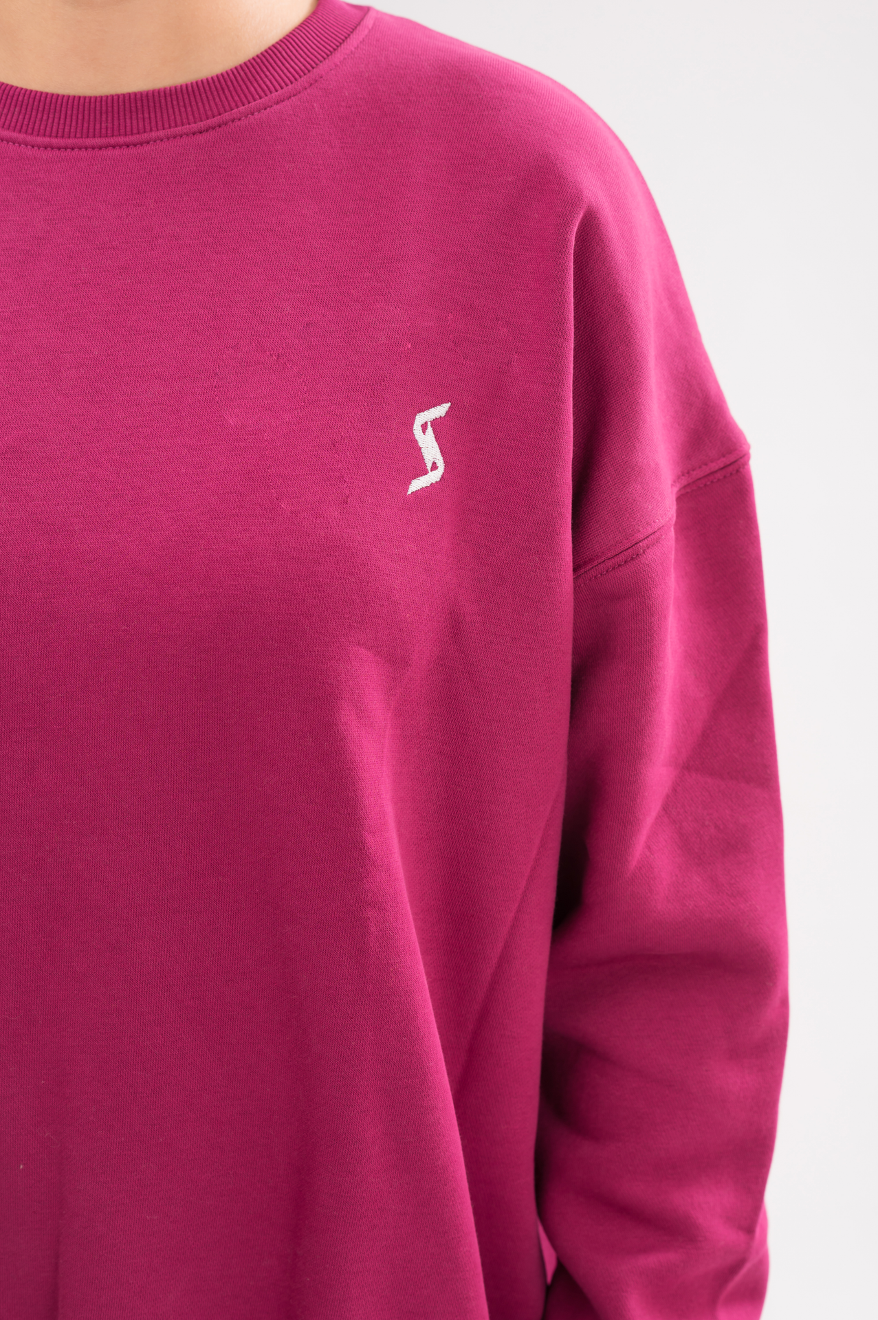 Close-up of the soft brushed interior of Women’s Vivacious Comfortable Loose Fit Sweatshirt, highlighting the premium cotton blend.