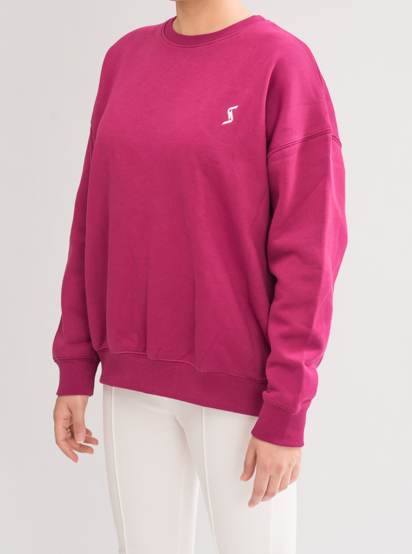 Side view of Women’s Vivacious Comfortable Loose Fit Sweatshirt, showcasing the relaxed fit and modern design.