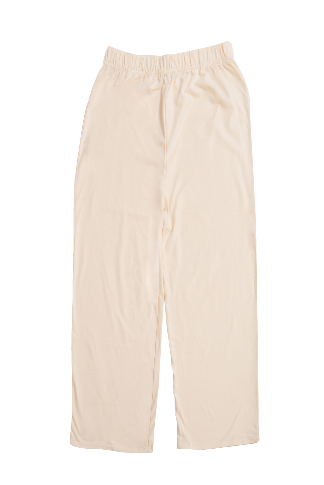 Close-up of the elasticated waist and soft fabric of Women’s Cream White Relaxed Fit Flared Cotton Blend Trousers, highlighting the stylish and comfortable design.