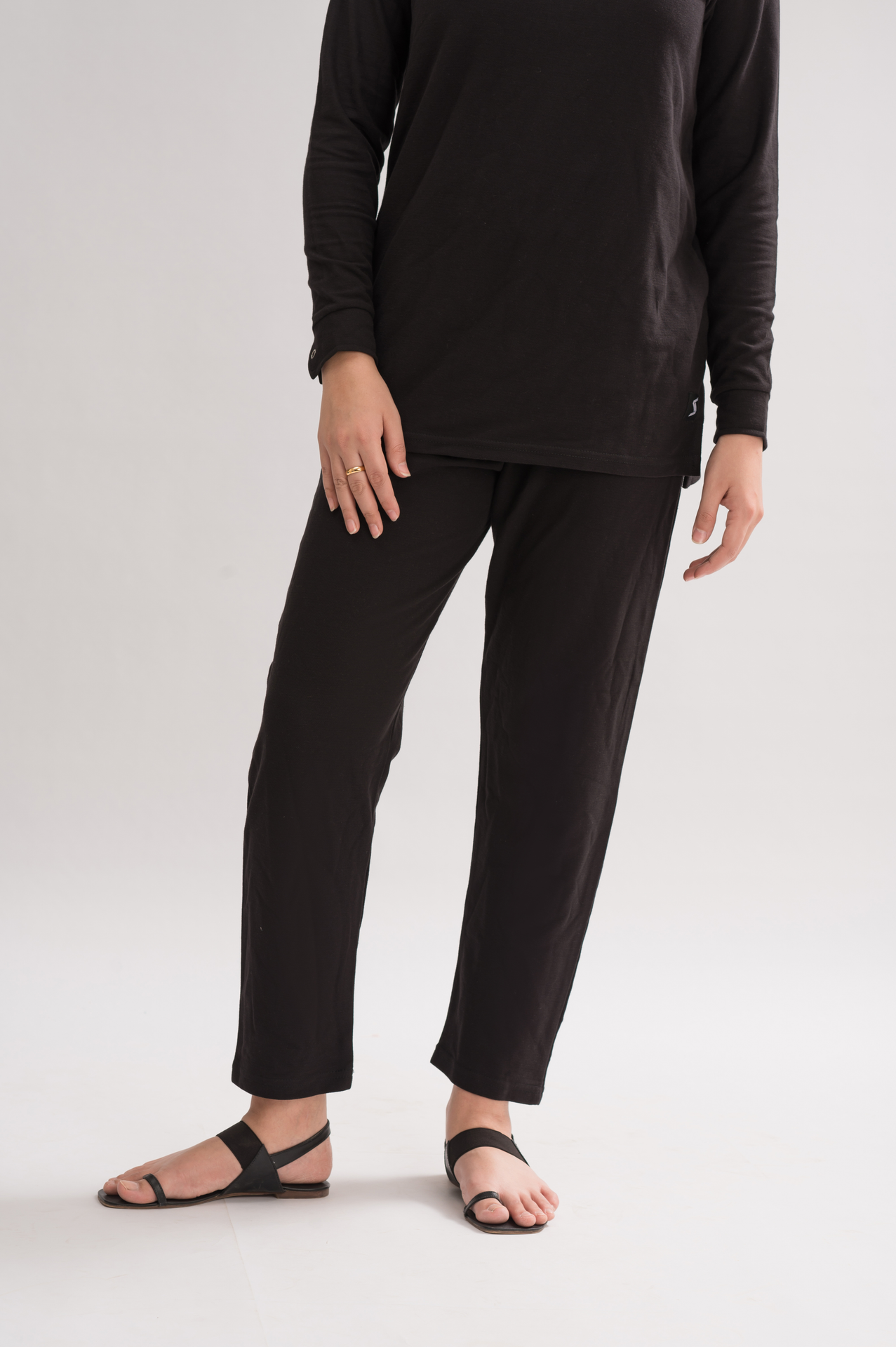 Women’s Black Honeycomb Pique Cotton Blend Pants front view, featuring an elasticated waistband and straight fit for a modern silhouette.